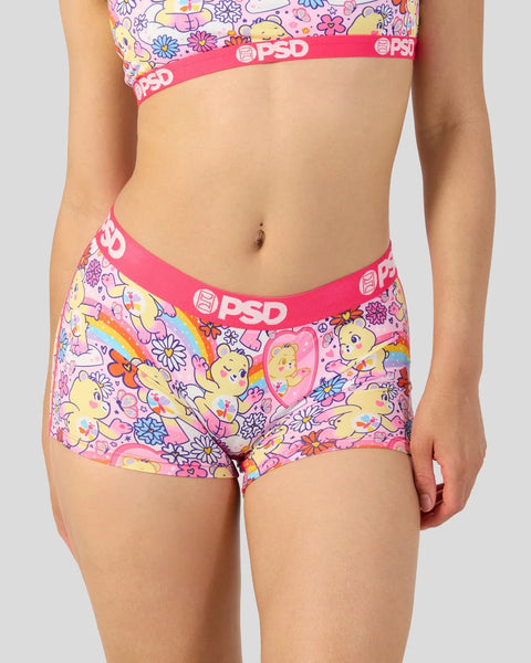 Care Bears printed boy shorts with pink PSD waistband and colorful bear and flower design.