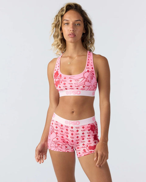 Pink sports bra and shorts set with Looney Tunes character print and white trim details.