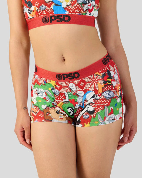 PSD Looney Tunes holiday-themed underwear with red waistband and colorful cartoon characters on red and white knit pattern.