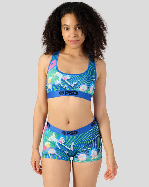 Blue sports bra and shorts set with colorful animated characters and wavy line patterns throughout.