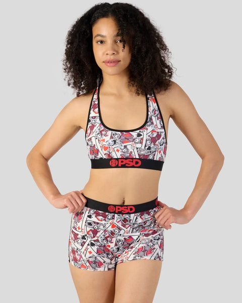 Sports bra and shorts set with red, black and white comic-style print and black PSD branding.