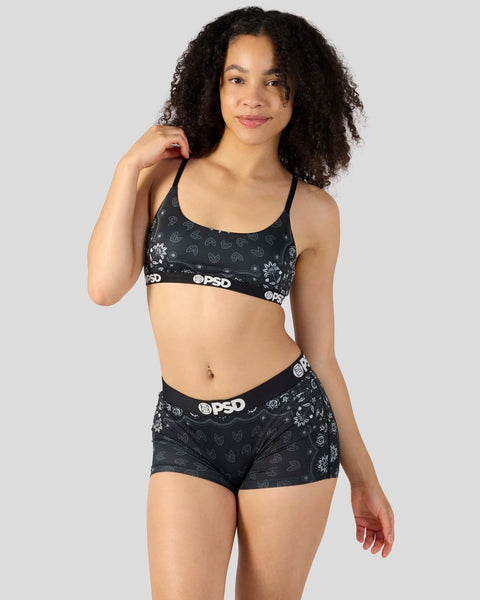 Black sports bra and boy shorts set with bandana print and branded waistband.