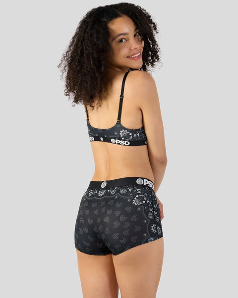 Black bralette and shorts set with bandana and floral print patterns and branded waistband.