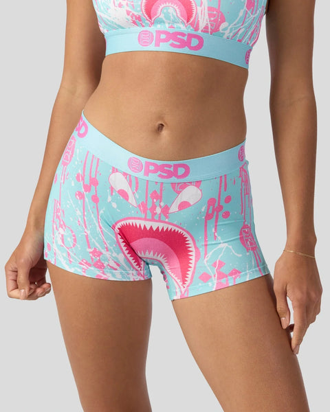 Light blue and hot pink shorts with cartoon monster mouth print and PSD waistband.