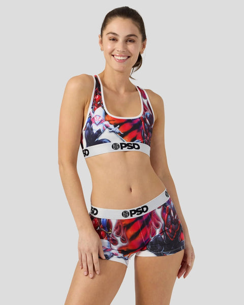 Woman wearing Spider-Man print sports bra and shorts with white PSD waistband.