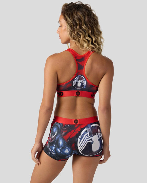 Red and black sports bra and shorts set with Venom character graphics and red trim details.