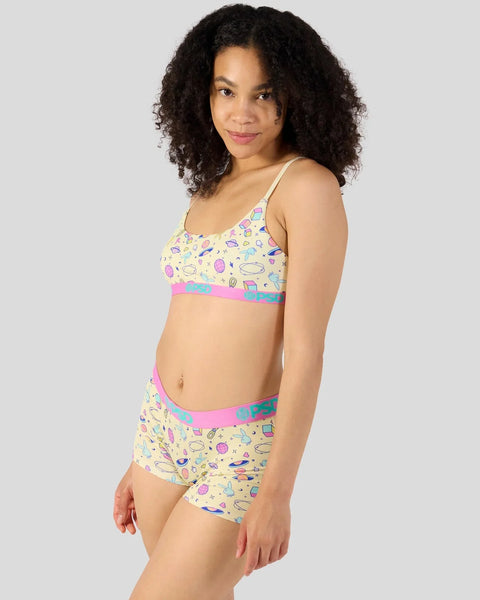 Yellow modal bra and boyshort set with colorful geometric pattern and pink trim.