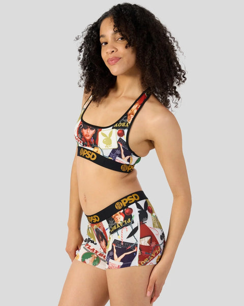 Woman wearing Playboy-branded bra and shorts set with multicolored vintage magazine cover print and black elastic waistbands.