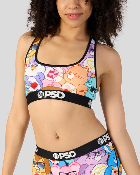 Sports bra with colorful Care Bears characters and black PSD elastic bands on chest and waistband.