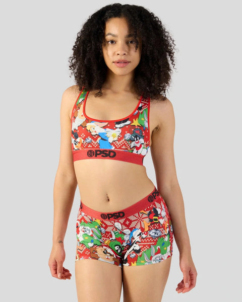 Red sports bra and shorts set with Looney Tunes holiday characters and knit pattern design.