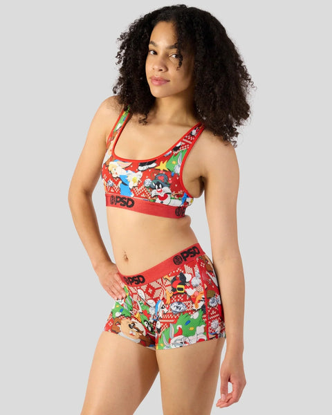Red sports bra and shorts set with Looney Tunes holiday characters and knit pattern design.