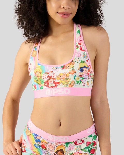 Halter sports bra and matching briefs with vintage cartoon character and strawberry print on cream and pink background.