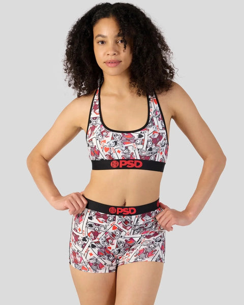 Sports bra and shorts set with red, black, and white abstract print and PSD waistband.