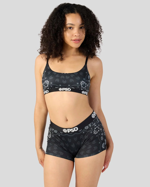 Black bandana-print sports bra and shorts set with white PSD branding and elastic waistbands.
