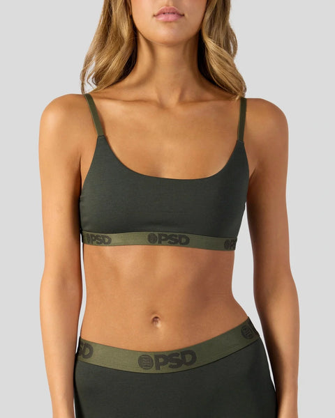 Woman wearing dark olive modal bralette with branded elastic band and matching briefs.