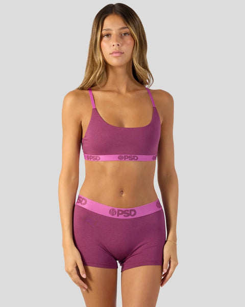 Magenta purple sports bra and boy short set with PSD branded elastic waistbands.