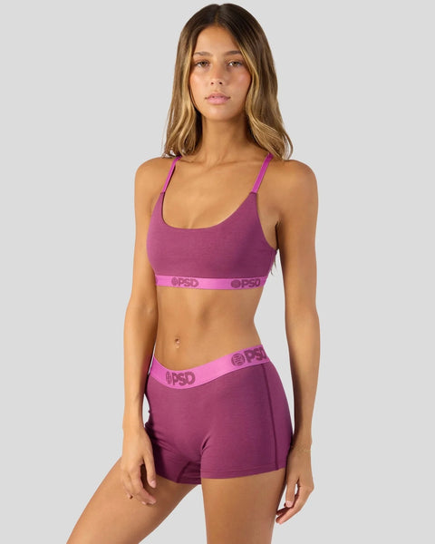 Magenta purple sports bra and matching boy shorts with PSD branded elastic waistband.