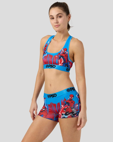 Blue sports bra and shorts set with red Spider-Man graphic print and PSD branding.