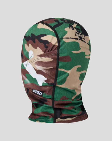 Balaclava with green, brown, and tan camouflage pattern and white graphic detail on front.