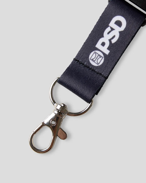 Black lanyard with white branding and metal clip attachment.