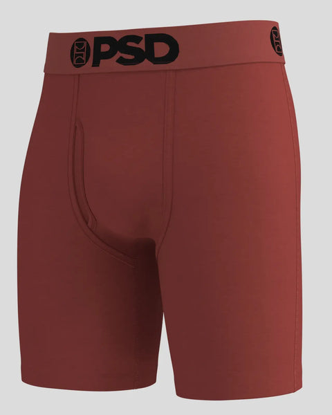 Sienna-colored modal shorts with black PSD waistband and logo on elastic band.