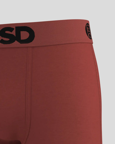 Sienna-colored modal solid underwear with black text waistband and center seam detail.