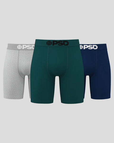 Three PSD boxer briefs in gray, teal, and navy with white waistband logos.
