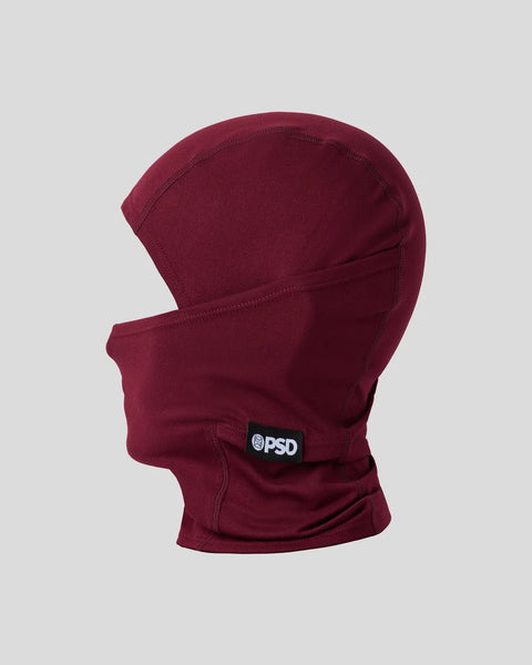 Dark burgundy balaclava with PSD brand label and face opening.