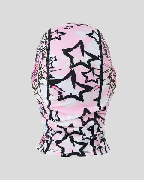 Pink and white knit balaclava with black star graphics and ornamental line patterns throughout.