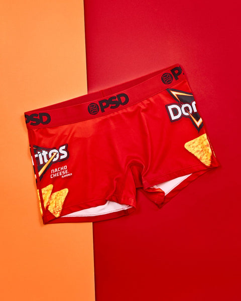 Two red Doritos Nacho Cheese chip bags displayed on a split orange and red background.