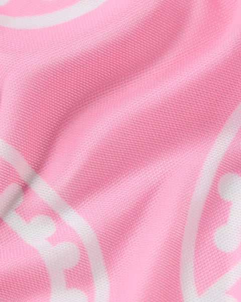 Pink mesh bandana with white geometric pattern and textured weave.