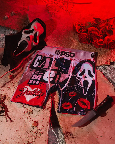 Ghost Face mask and PSD boxers displayed on red background with roses and knife prop.